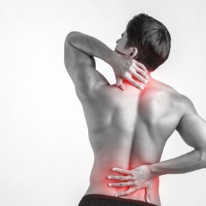 close up man rubbing his painful back isolated white background